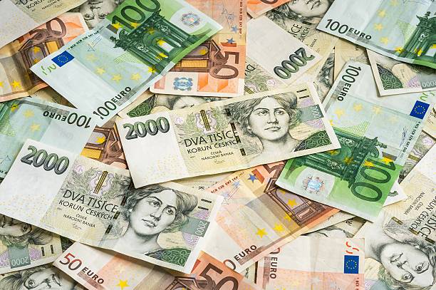 istock Czech and Euro banknotes background 497222204