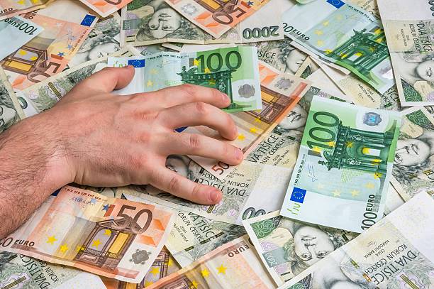 istock Stingy hands takes money 497222340