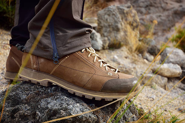 istock Outdoor hiking shoes in mountains. 497222814