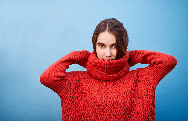 Go red or go home Cropped shot of a young woman posing against a colorful backgroundhttp://195.154.178.81/DATA/i_collage/pu/shoots/805920.jpg high collar stock pictures, royalty-free photos & images