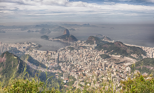 Panorama of Rio de Janeiro city in Brazil from the Corcovado mountain. 360° view on Copacabana beach, the Sugarloaf Mountain and the city.