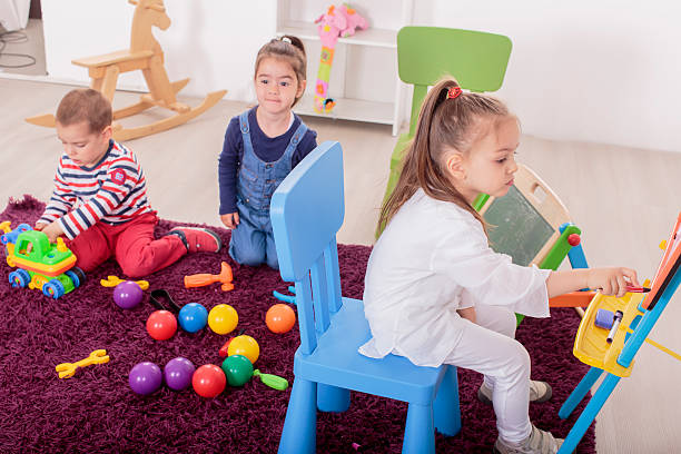 istock Kids playing in the room 497225991