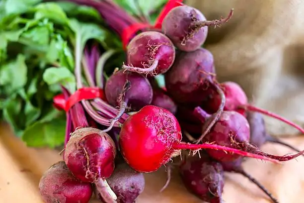 Red beets are displayed at a farmer's market in Sacramento, California.