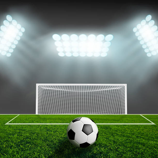 istock Soccer ball on green stadium arena 497226447