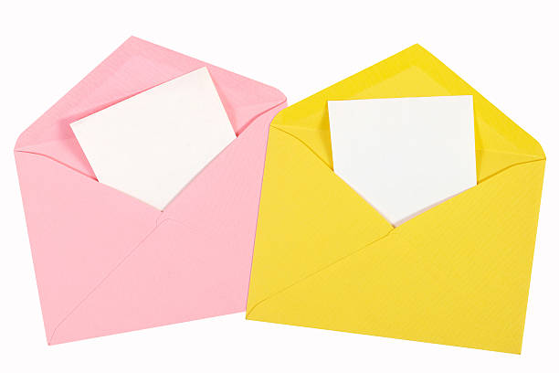 istock pink and yellow open envelope with paper Isolated 497226871