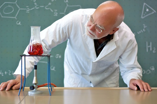 Teachers heated chemicals in a glass flask