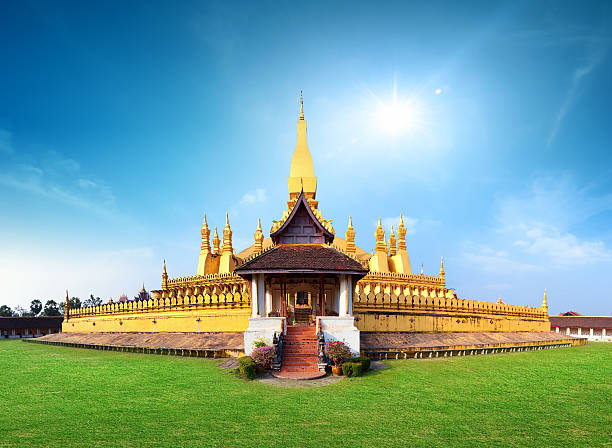 Phra That Luang temple and landmark in Laos, Vientiane Laos travel landmark, golden pagoda wat Phra That Luang in Vientiane. Buddhist temple. Famous tourist destination in Asia laos photos stock pictures, royalty-free photos & images