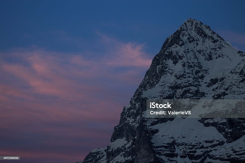 Monte Eiger montanha durante o pôr do sol, a região de Jungfrau - Foto de stock de Alpes europeus royalty-free