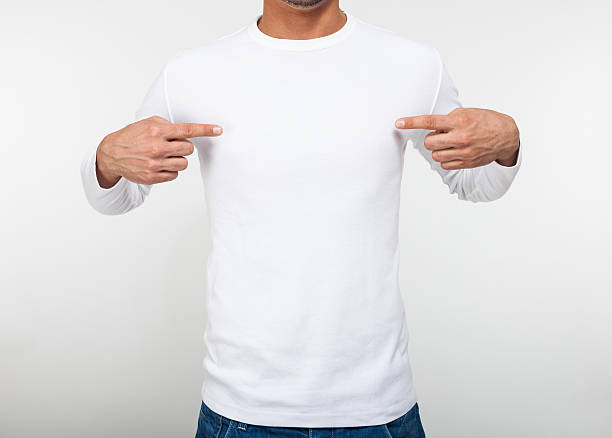 istock Man pointing his fingers on a blank t-shirt 497232301