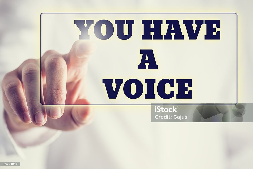 You have a voice Phrase You have a voice on a virtual interface in a navigation bar with a businessman touching it with his finger from behind. Auto Post Production Filter Stock Photo