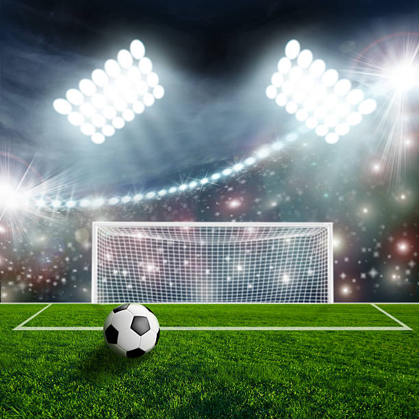 istock Soccer ball on green stadium arena 497242859