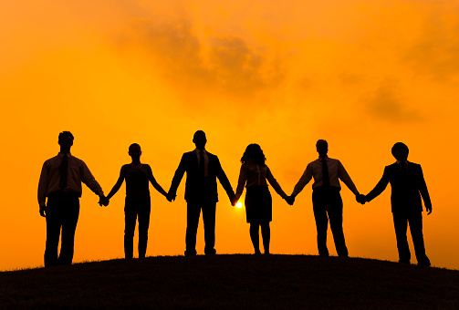 Group of Business People Holding Hand
