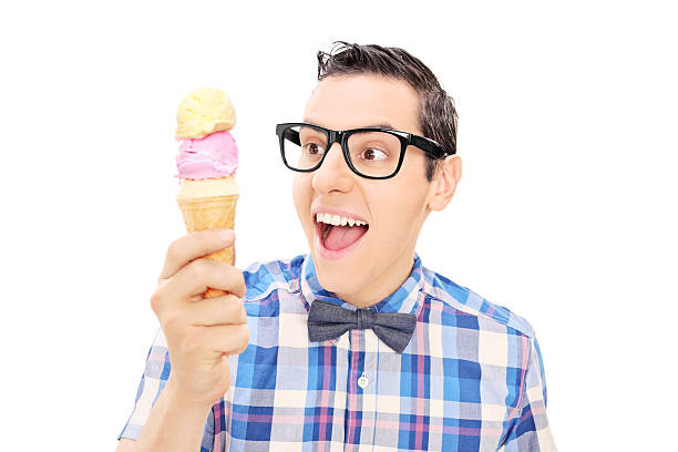 istock Excited young man holding an ice cream 497247029