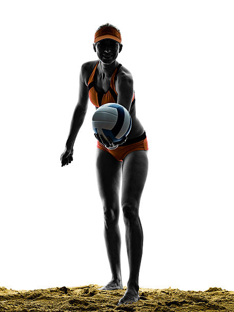 istock woman beach volley ball player silhouette 497247916