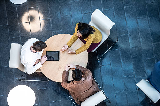 istock Business people meeting in modern office, view from above 497249216