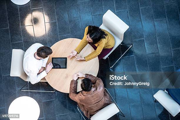 Business People Meeting In Modern Office View From Above Stock Photo - Download Image Now