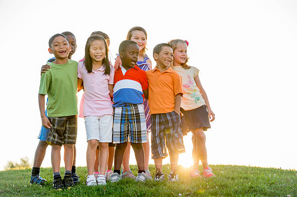 istock Children Together on a Hill Top 497249816