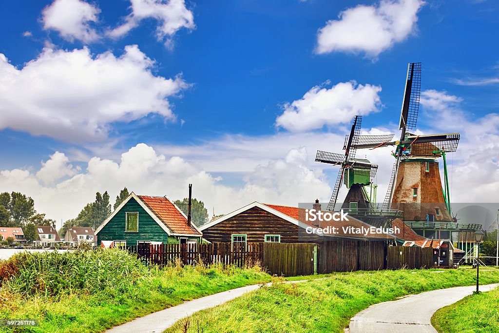 Unique old, authentic, suburbs of Amsterdam Unique old, authentic, real working windmills in the suburbs of Amsterdam, the Netherlands.Unique old, authentic, real working windmills in the suburbs of Amsterdam, the Netherlands. 2015 Stock Photo