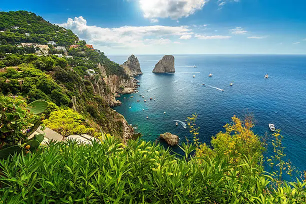 Faraglioni cliffs panorama,and the stunning Tyrrhenian sea,Capri island,Campania,Italy,Europe