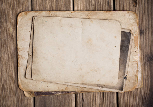 istock Old paper on the wood background 497252809