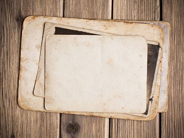 istock Old paper on the wood background 497252813