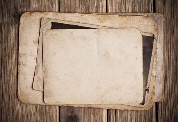 istock Old paper on the wood background 497252815