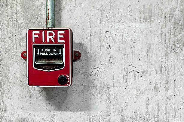 Fire alarm switch Fire alarm switch on factory wall fire alarm photos stock pictures, royalty-free photos & images