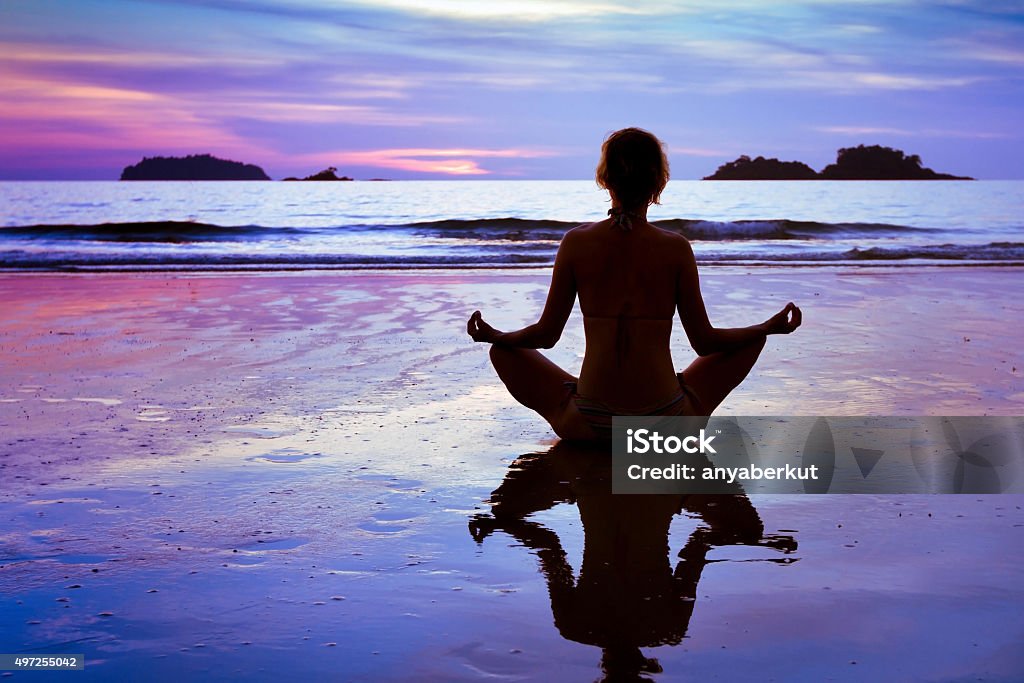 blue yoga background yoga on the beach Health Club Stock Photo