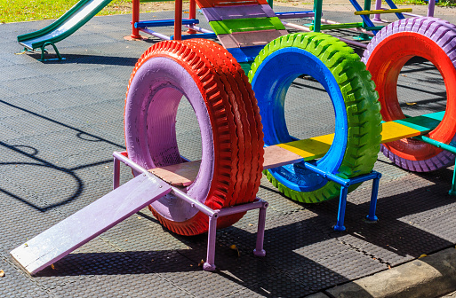 Playground made forn recycling rubber tire.