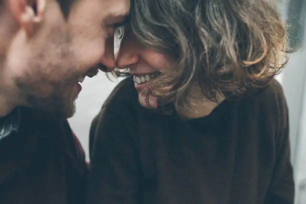 Vintage couple hugs and laughing .Coffee shop. instagram toned