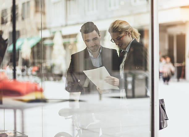 istock Businessman with his colleague communicating 497257330