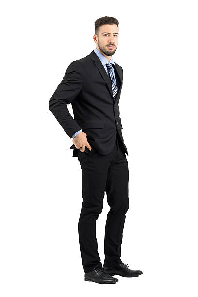 istock Business man putting cellphone in his pants pocket side view 497259626