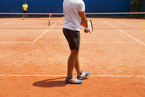 перерыв точка - tennis serving men court стоковые фото и изображения