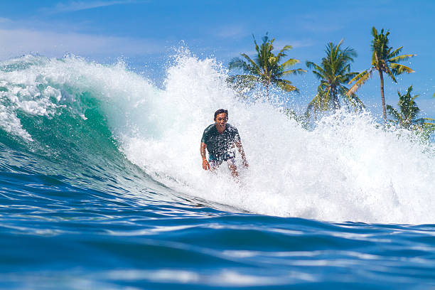 istock Surfing a Wave. Bali Island. Indonesia. 497268259