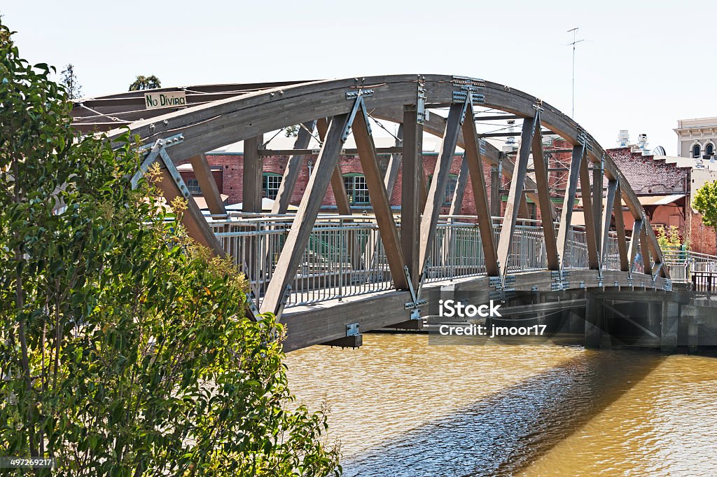 Petaluma Walking Bridge This walking bridge crosses the Petaluma River for the visitors and shoppers crossing from the Plaza to the shapping mall. Petaluma Stock Photo