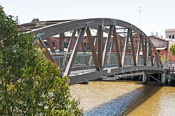 Petaluma Walking Bridge This walking bridge crosses the Petaluma River for the visitors and shoppers crossing from the Plaza to the shapping mall. petaluma stock pictures, royalty-free photos & images