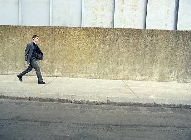 istock Businessman Walking on Street 497272181
