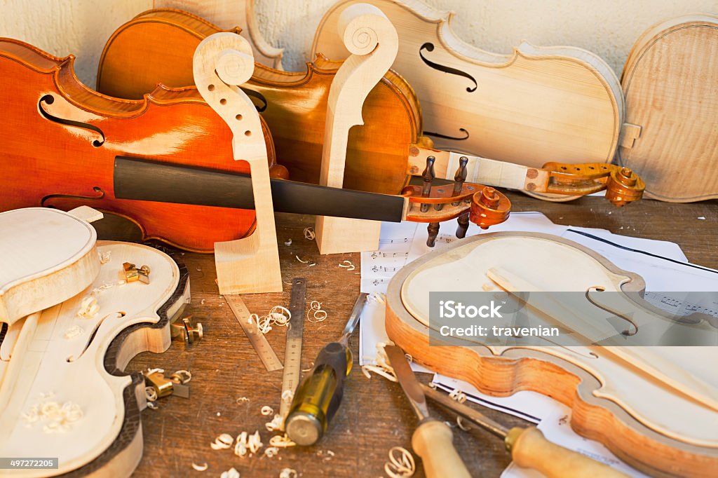 Violin Maker's Table Violin Maker's Table and Tools Arrangement Stock Photo