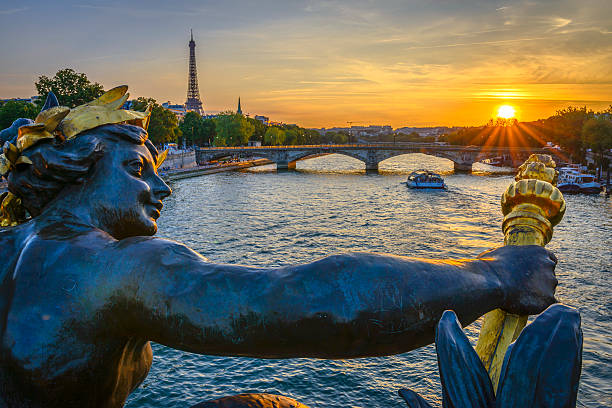 istock Pont des Invalides and Eiffel tower at sunset 497272261