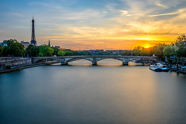 istock Pont des Invalides and Eiffel tower at sunset 497272271