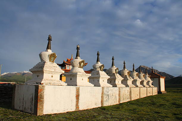 istock White stupas and buildings in Gerisi Temple in sunset light 497272413