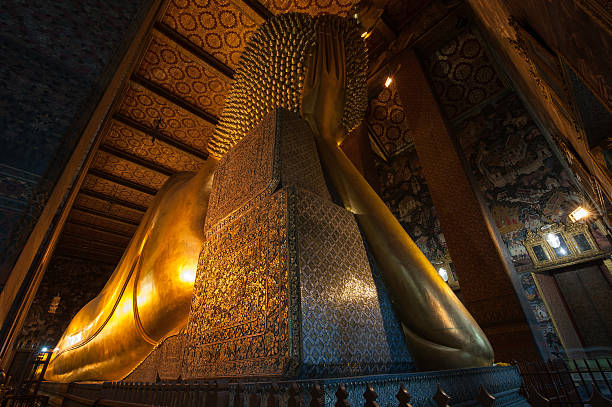 istock Reclining Buddha ,Wat pho bangkok in Thailand 497272623