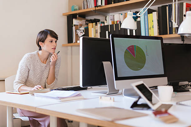 istock Business woman working in small  office, Barcelona. 497274582