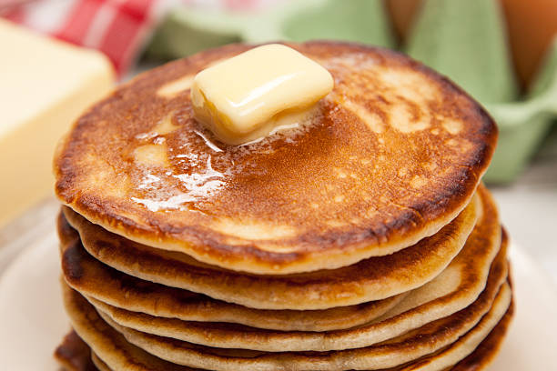 istock High pile of delicious pancakes 497274632