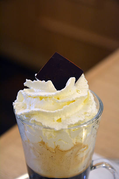 istock Delicious Hot Viennese Coffee In Glass Cup With Whipped Cream 497276708
