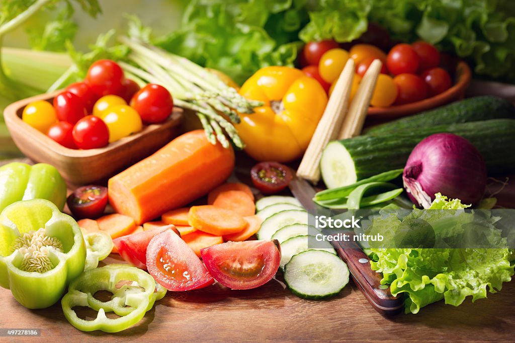 fresh vegetables on cutting board various fresh vegetables on cutting board 2015 Stock Photo