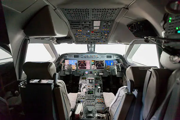 Inside view Cockpit G550 with blue sky and clouds