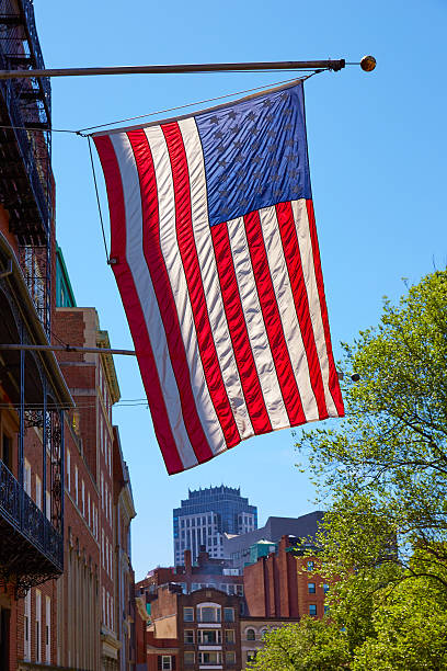 istock American flag in Boston downtown Massachusetts 497279418