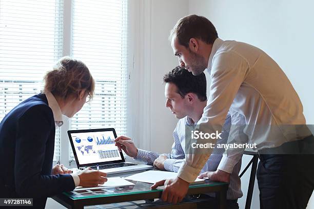 Temwork Business Team With Laptop In The Office People Working Stock Photo - Download Image Now