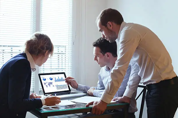 Photo of temwork, business team with laptop in the office, people working